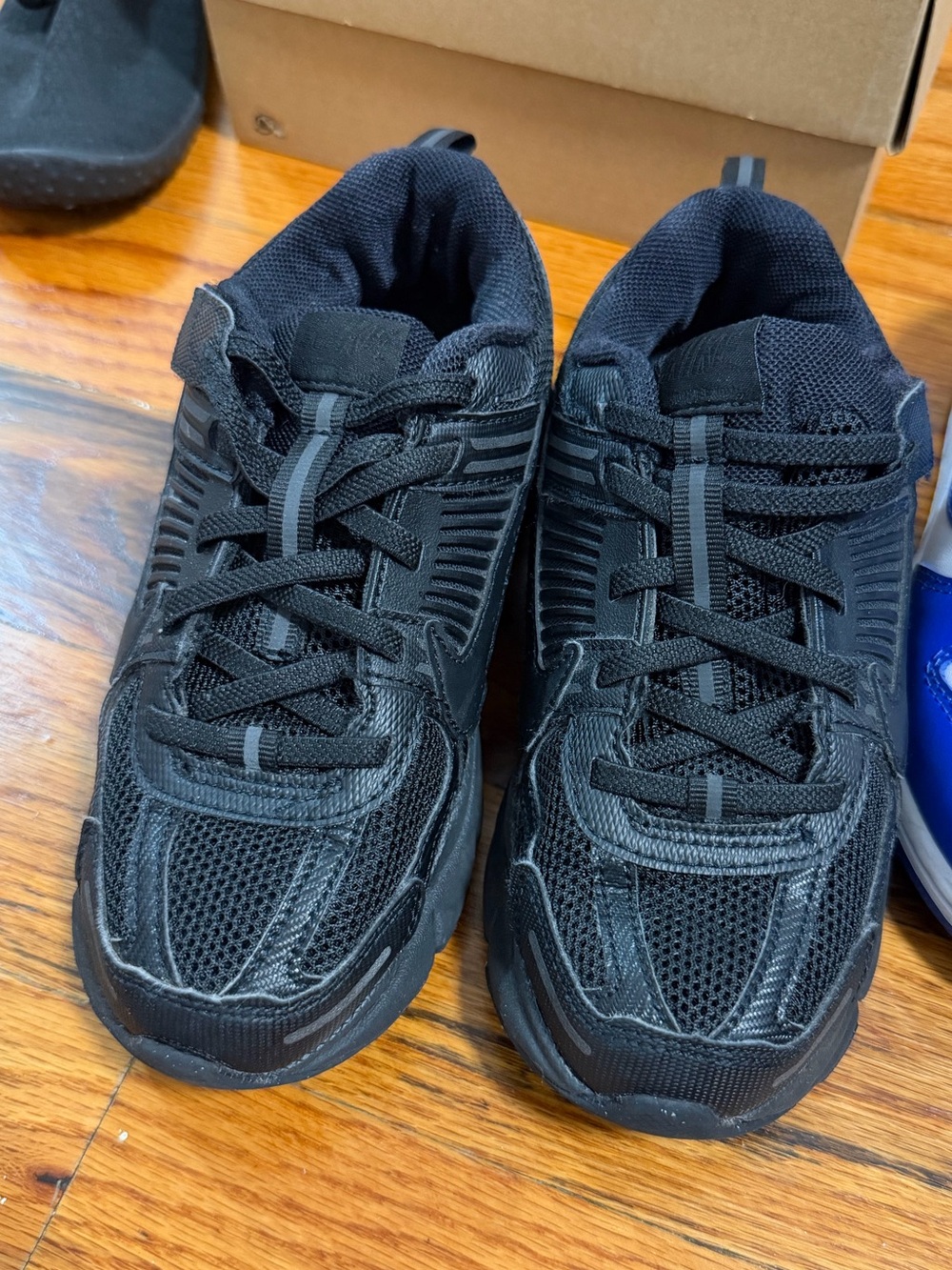 Nike Kids All-Black Mesh Lace-Up Sneakers